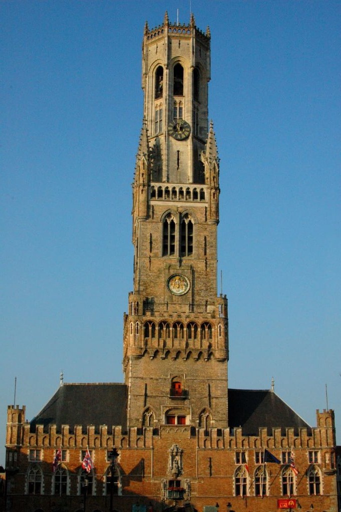 The Belfry of Bruges against a blue sky