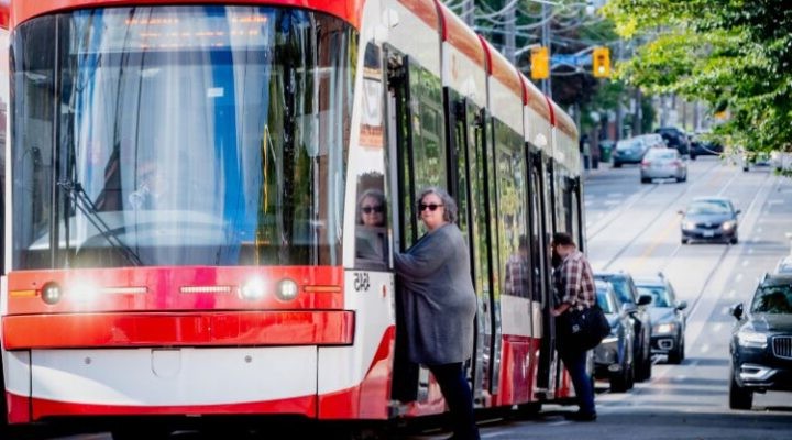 Solo traveler on a city streetcar
